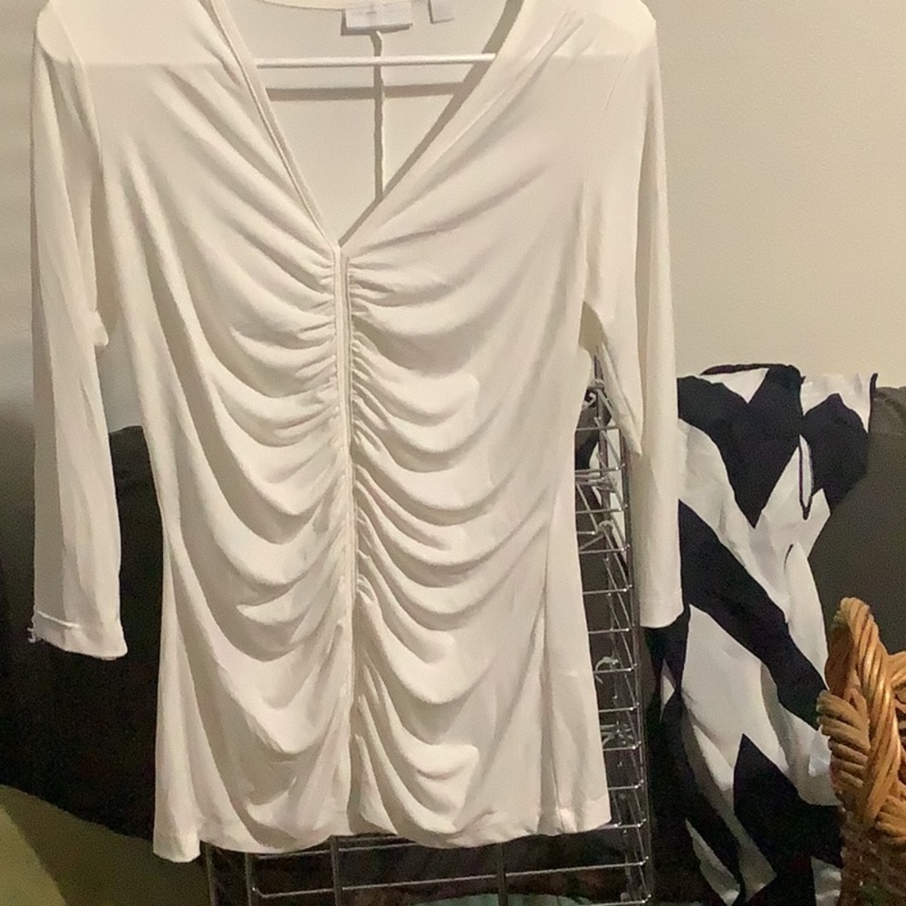 A white long sleeve T-shirt that’s great for going out